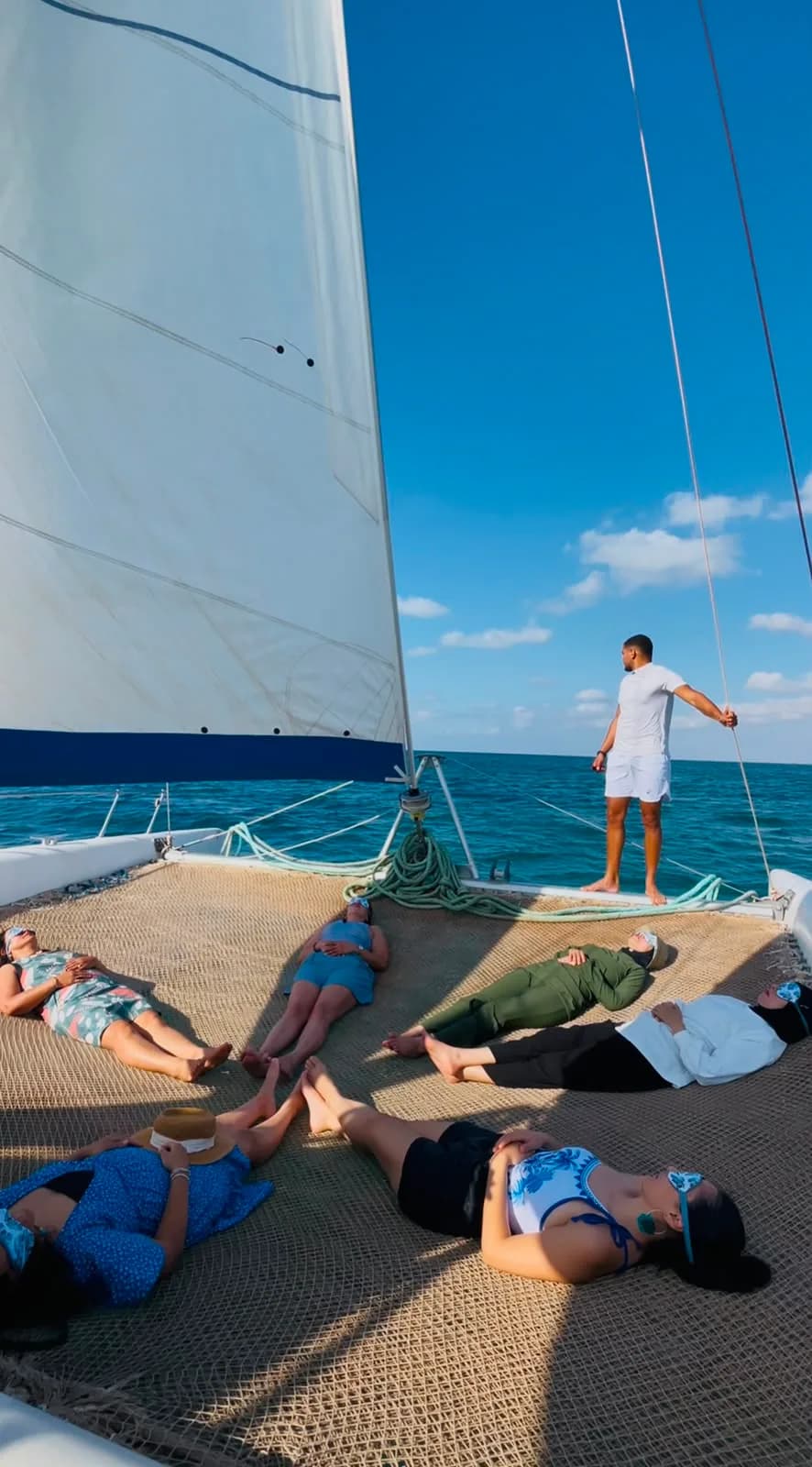 Yoga and relaxation session on the catamaran nets