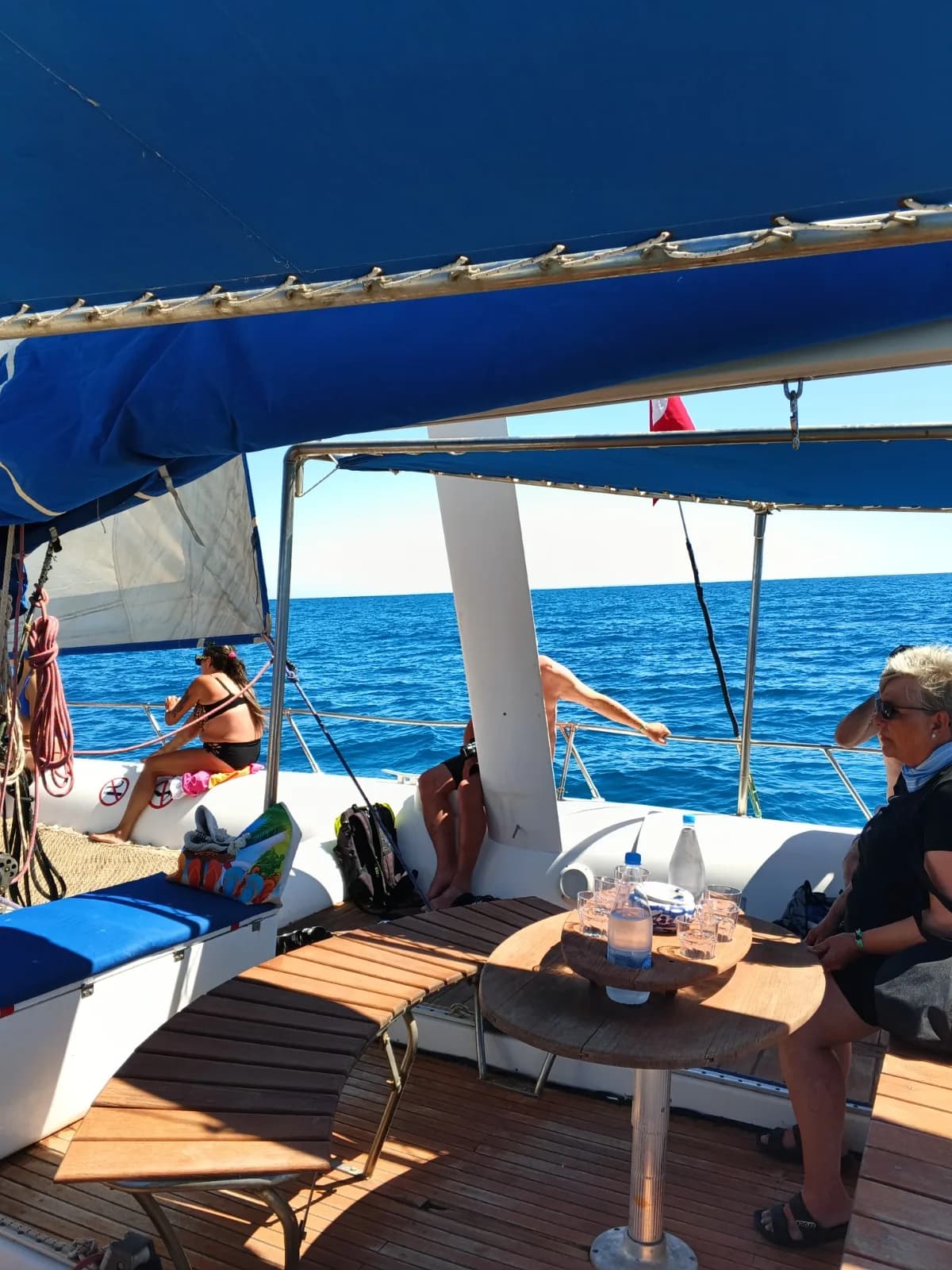 Relaxation area and wooden deck of the catamaran